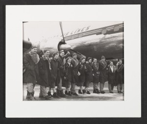 Photograph of Canadian Olympic Team Members, Cortina d'Ampezzo, Winter Olympic Games, 1956.  Frank J. Shaughnessy Jr., Chef de Mission, is 7th from the right.