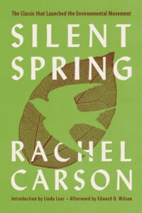 Book cover for Silent Spring by Rachel Carson - The classic that launched the environmental movement. Introduction by Linda Lear, Afterward by Edward O. Wilson. The cover is a soft green with a red veiny leaf. Inside the leaf is the cutout image of a bird in flight. The title and author are overlayed in large white text.